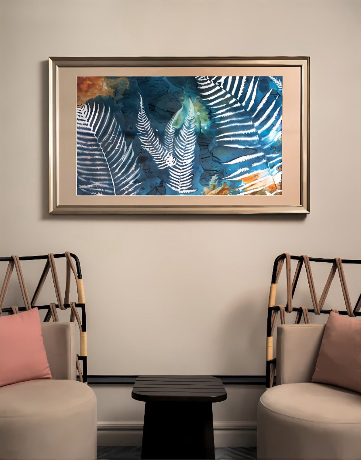 Framed abstract cyanotype on a wall above two chairs with pink cushions at Fairmont Orchid  Hotel, Hawaii Island